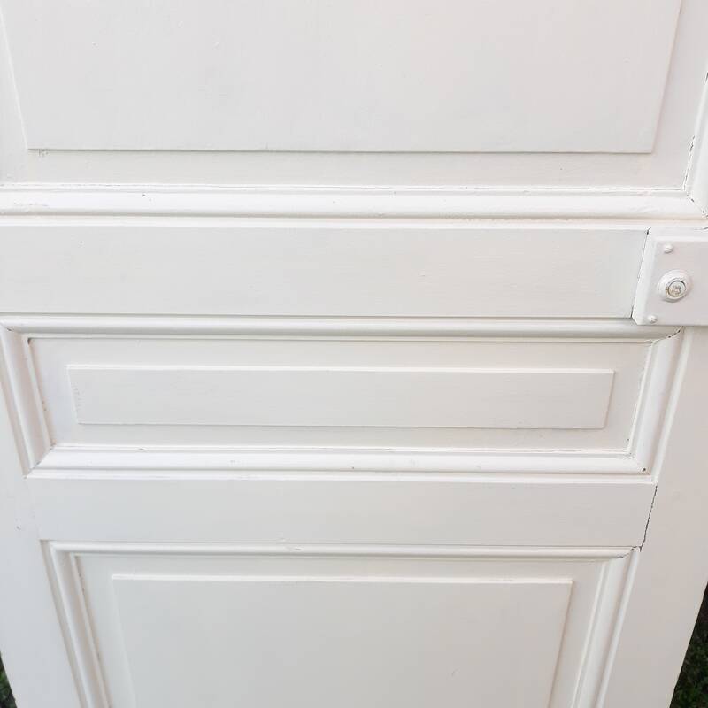 Communication door H220xW80.5cm, old panelled with moulding.