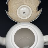 Ceramic and metal teapot with felt insulation