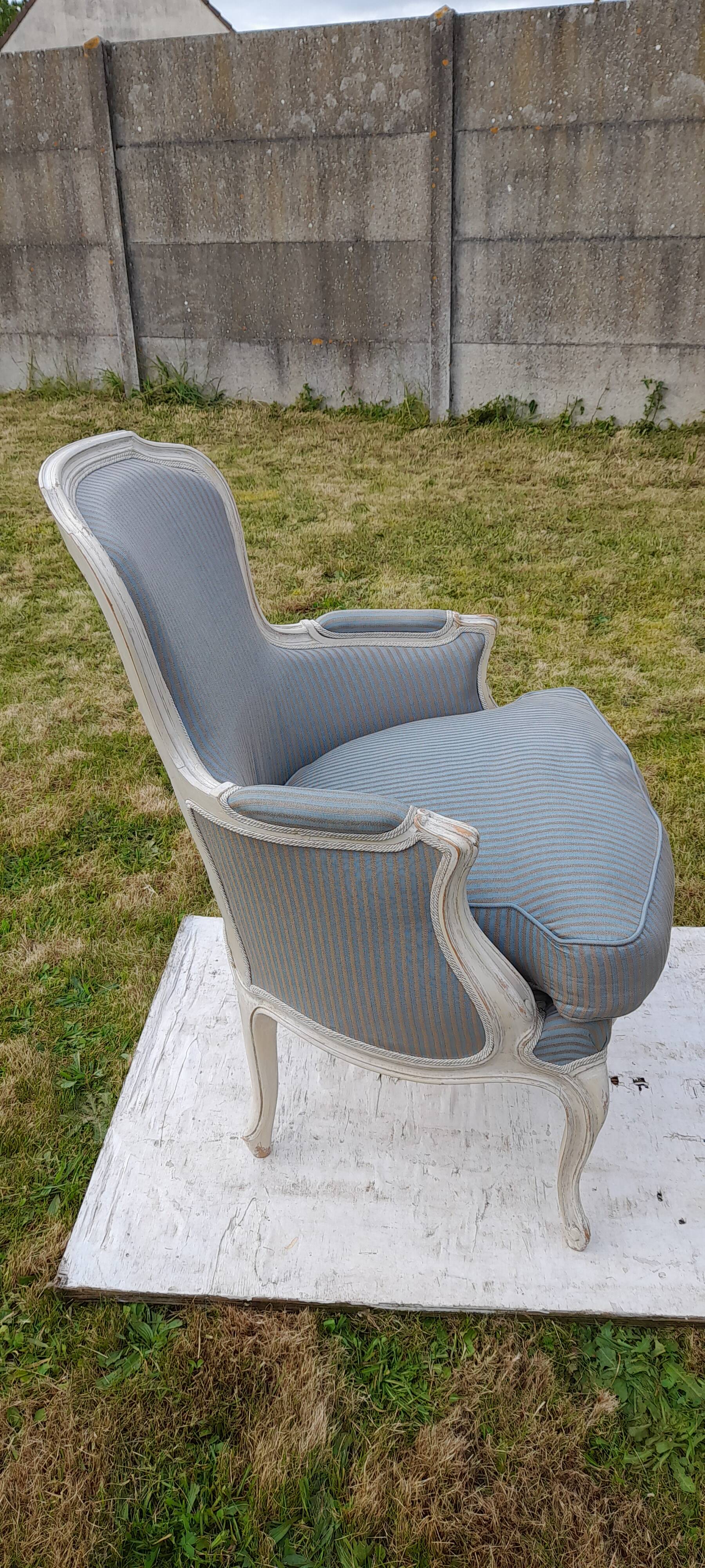 Bergère armchair with blue striped seat and back