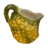 Pitcher bunch yellow and green grape slurry