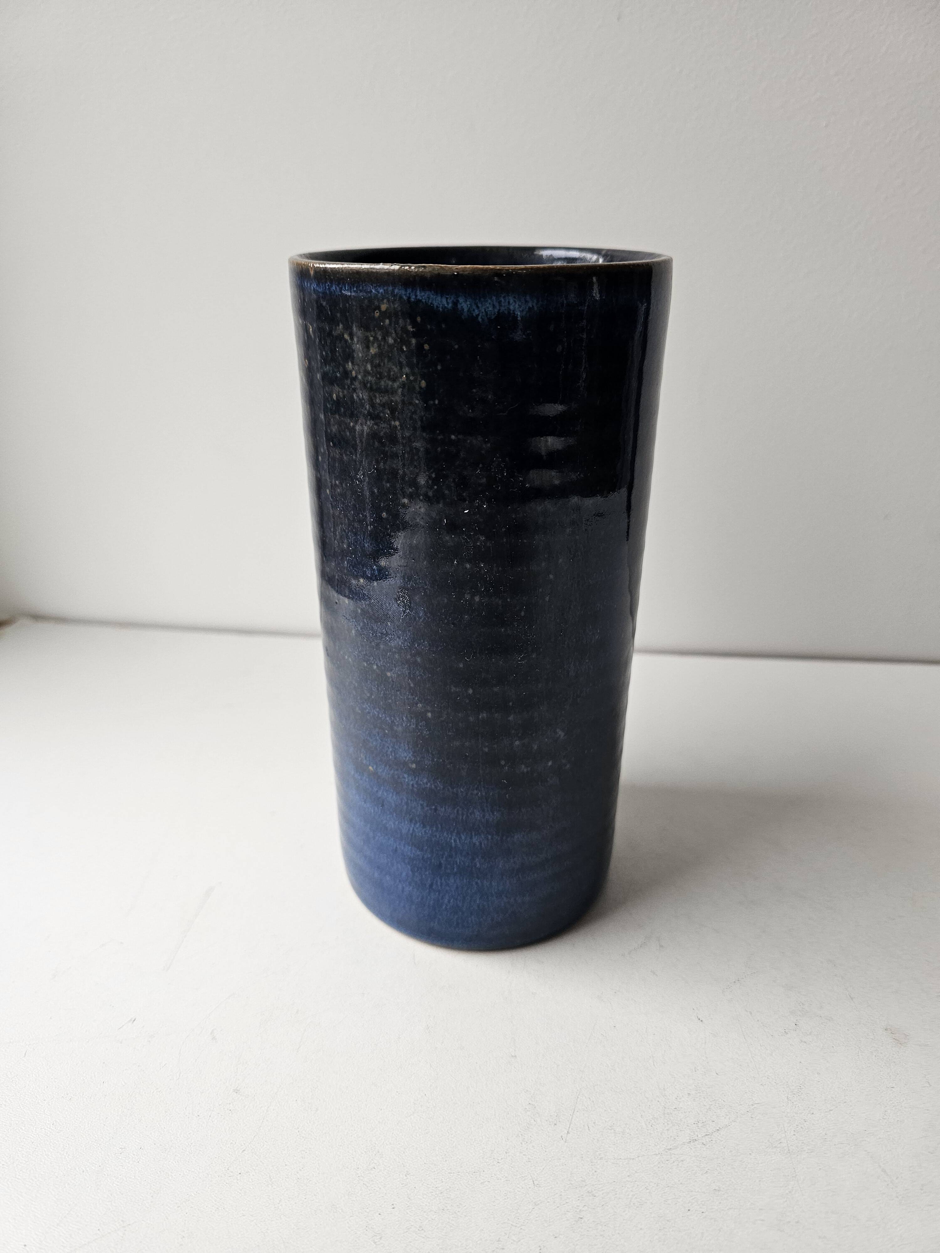 Blue ceramic vase with roller signed AB (signature to be identified)