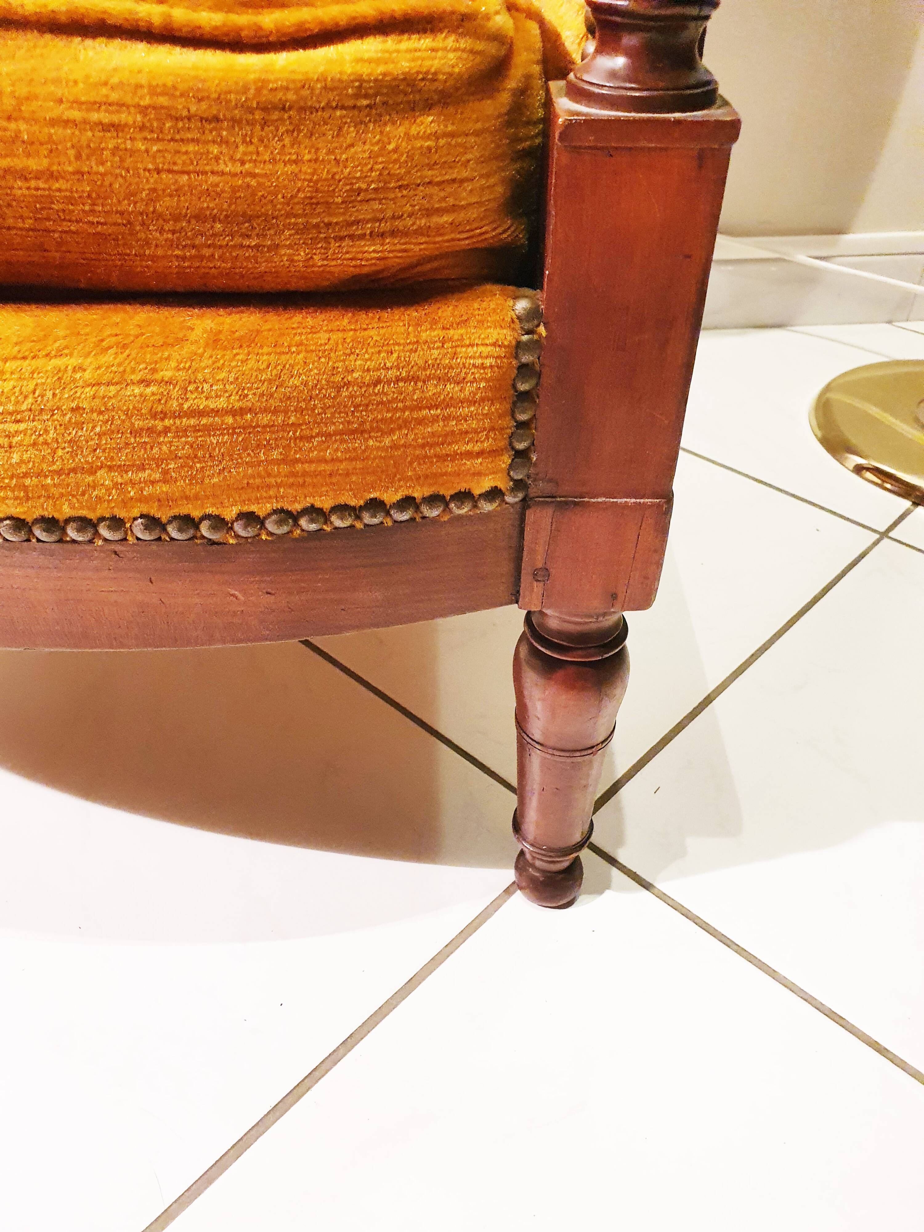 Armchair and footrest