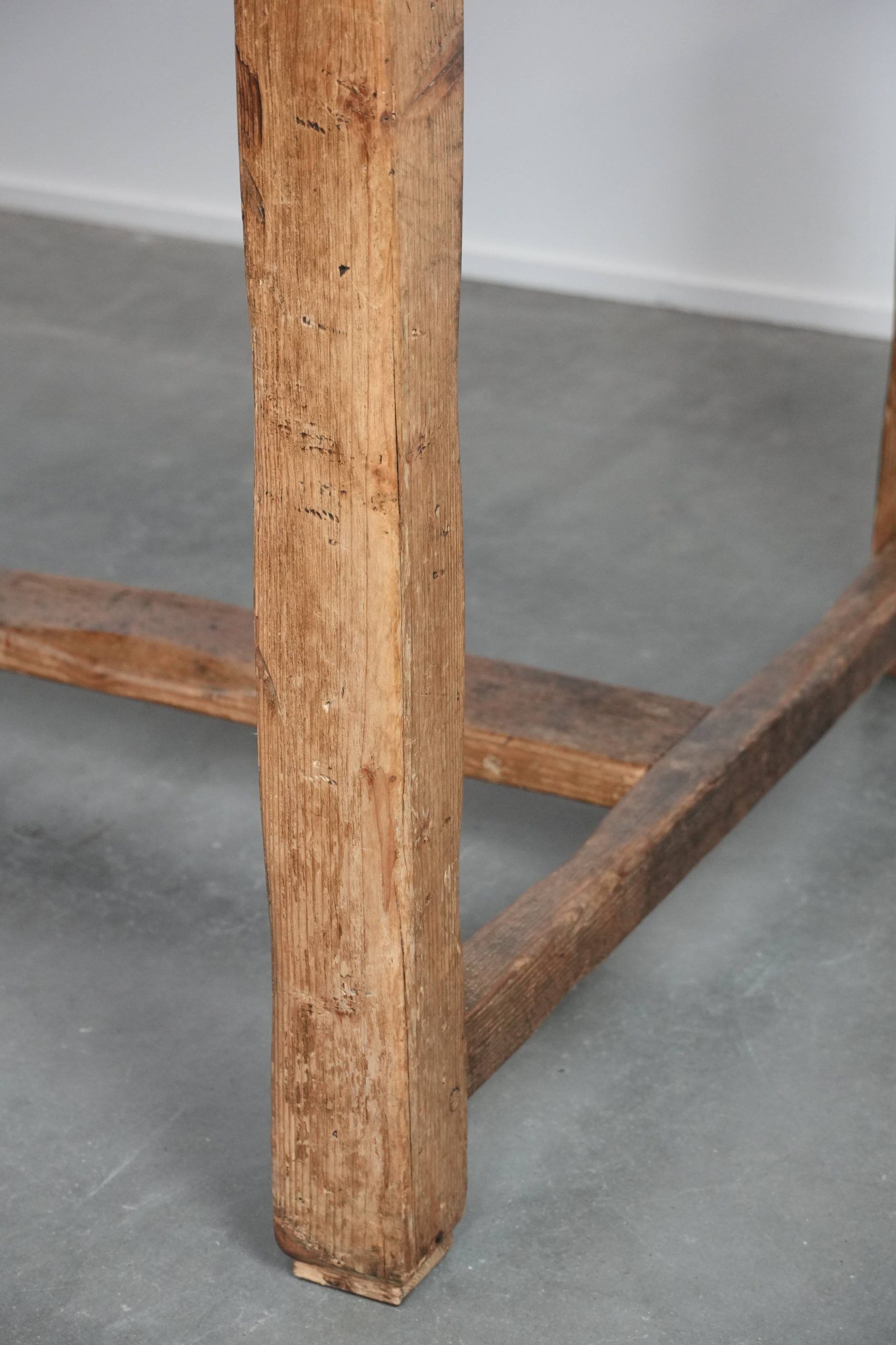 Magnificent and robust antique farmhouse dining table made of pine wood