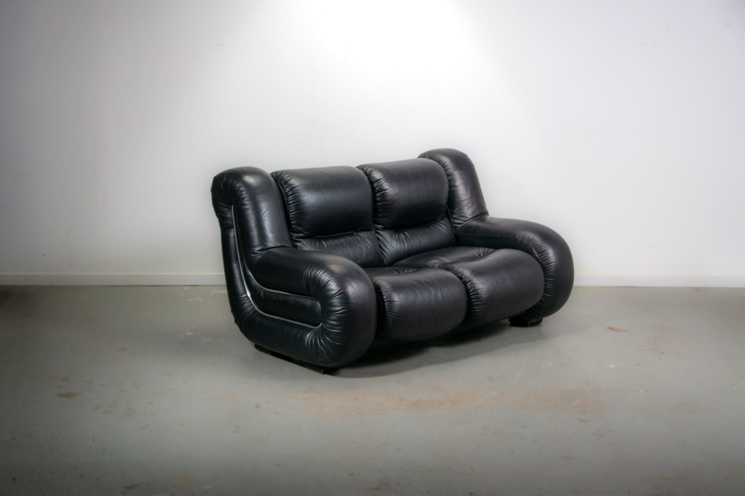 Black leather space age Italian 2 seater sofa