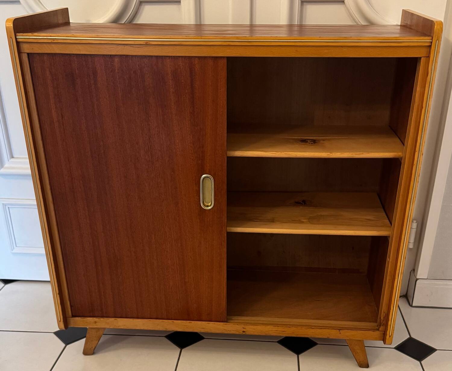 Vintage shoe cabinet with compass legs
