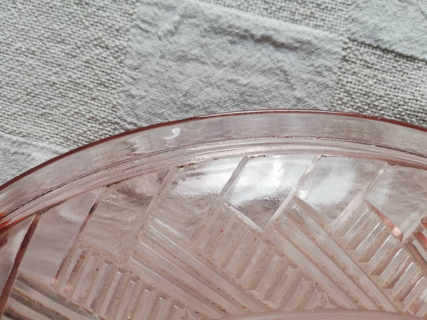 Antique ceiling light in frosted and engraved pink glass.