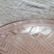 Antique ceiling light in frosted and engraved pink glass.