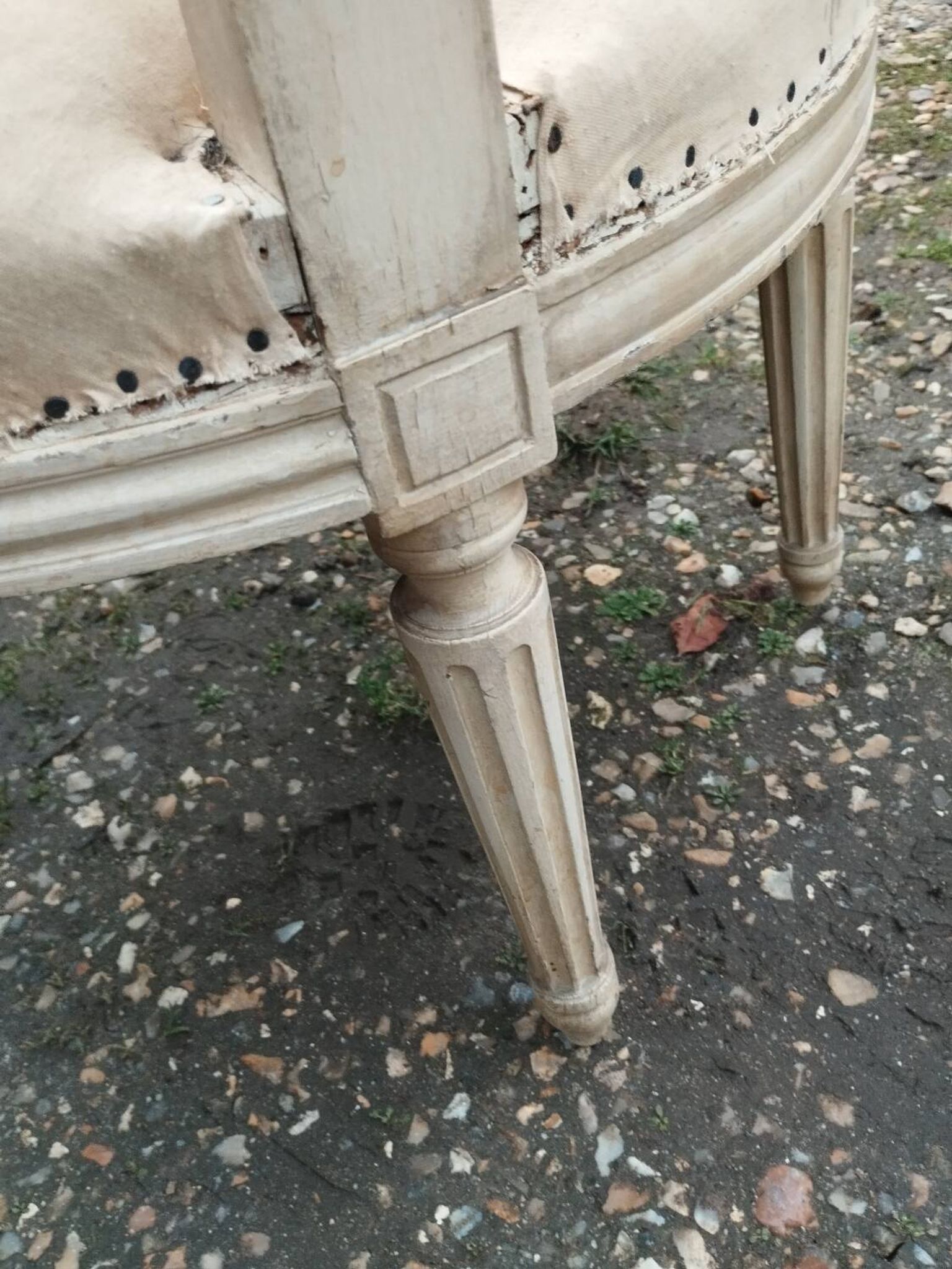 Antique armchair in Louis XVI style from the late 19th century.