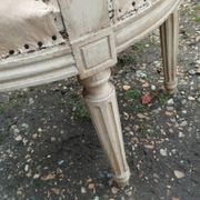 Antique armchair in Louis XVI style from the late 19th century.
