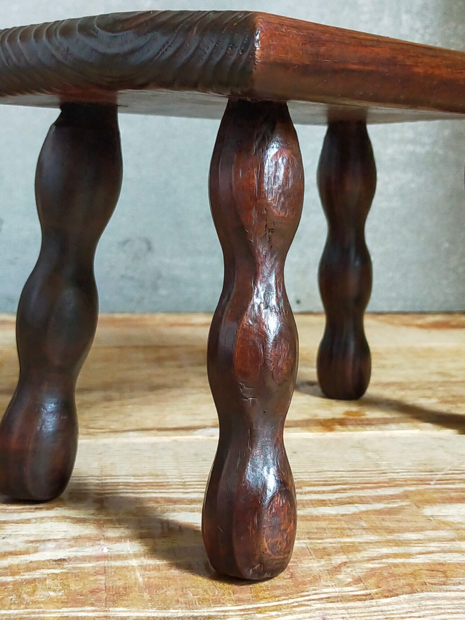 Pair of vintage solid turned wood footstools