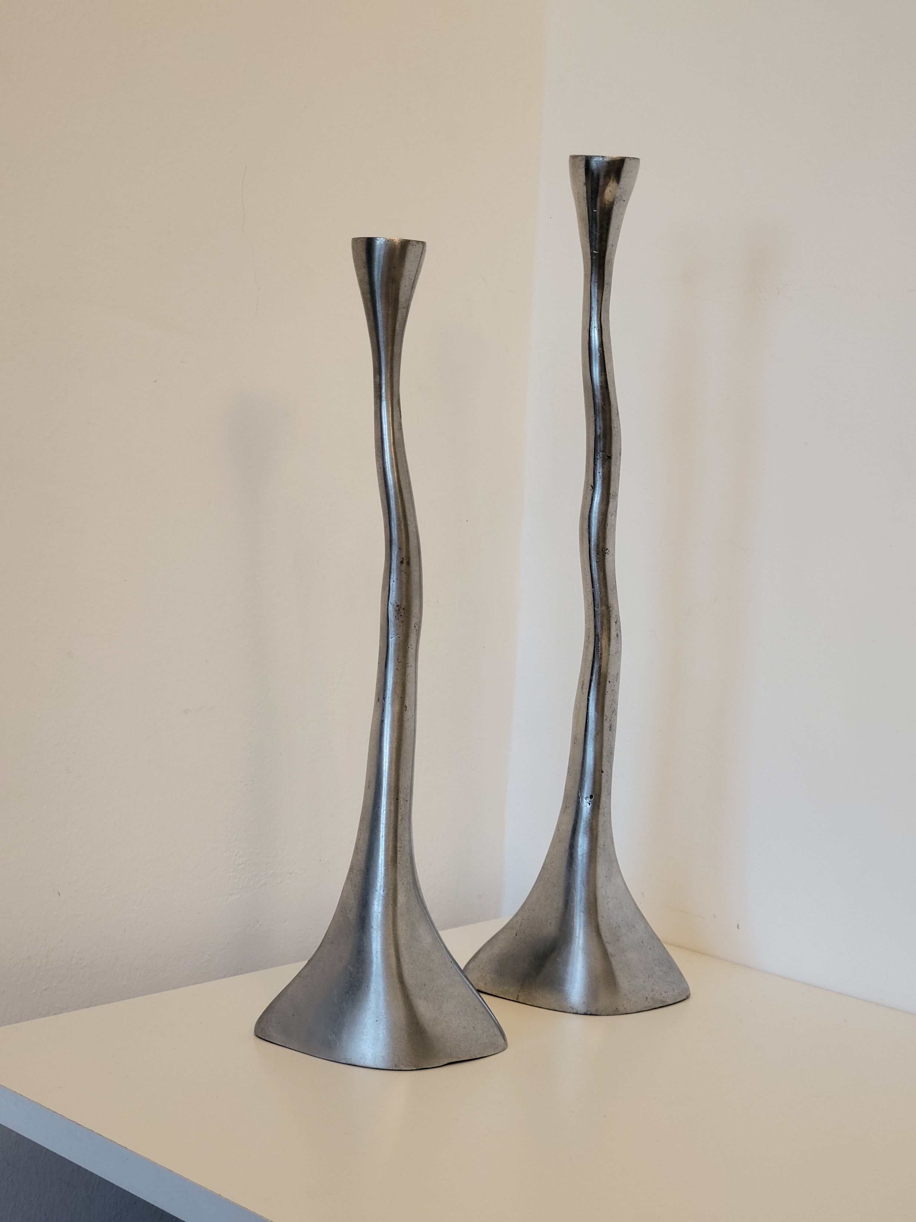 Pair of brutalist metal candlesticks in organic shape sleek design