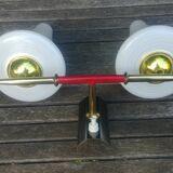 Vintage wall light from the 40s/50s with its two glass sconces on a brass support