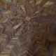 Round marquetry coffee table with curved legs in Louis XV style.
