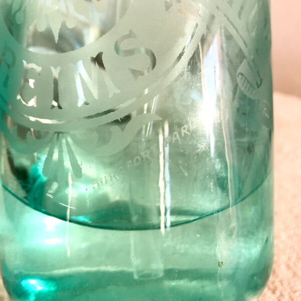 Ancien siphon en verre bleu