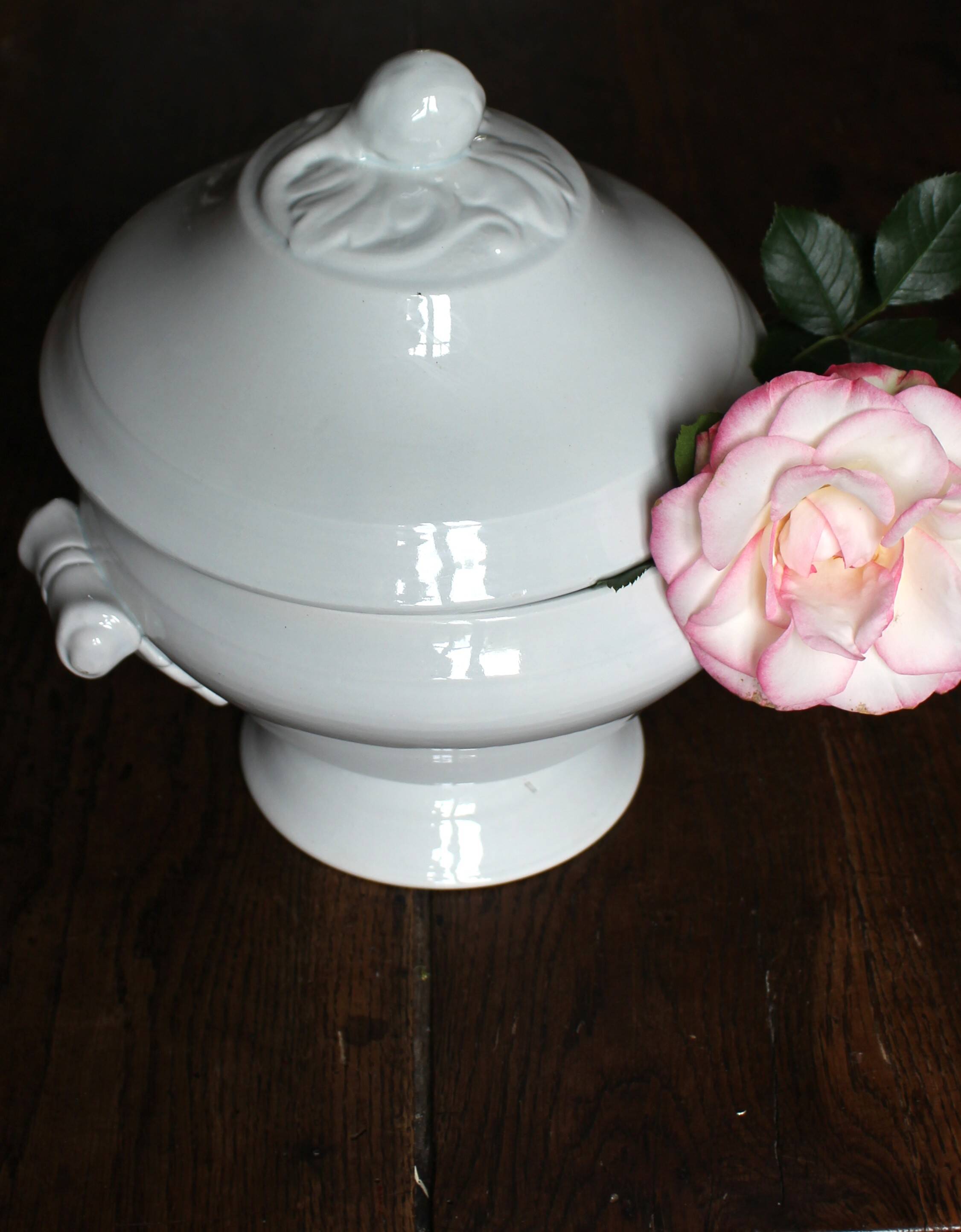 Antique soup tureen, white earthenware, with stopper decoration.