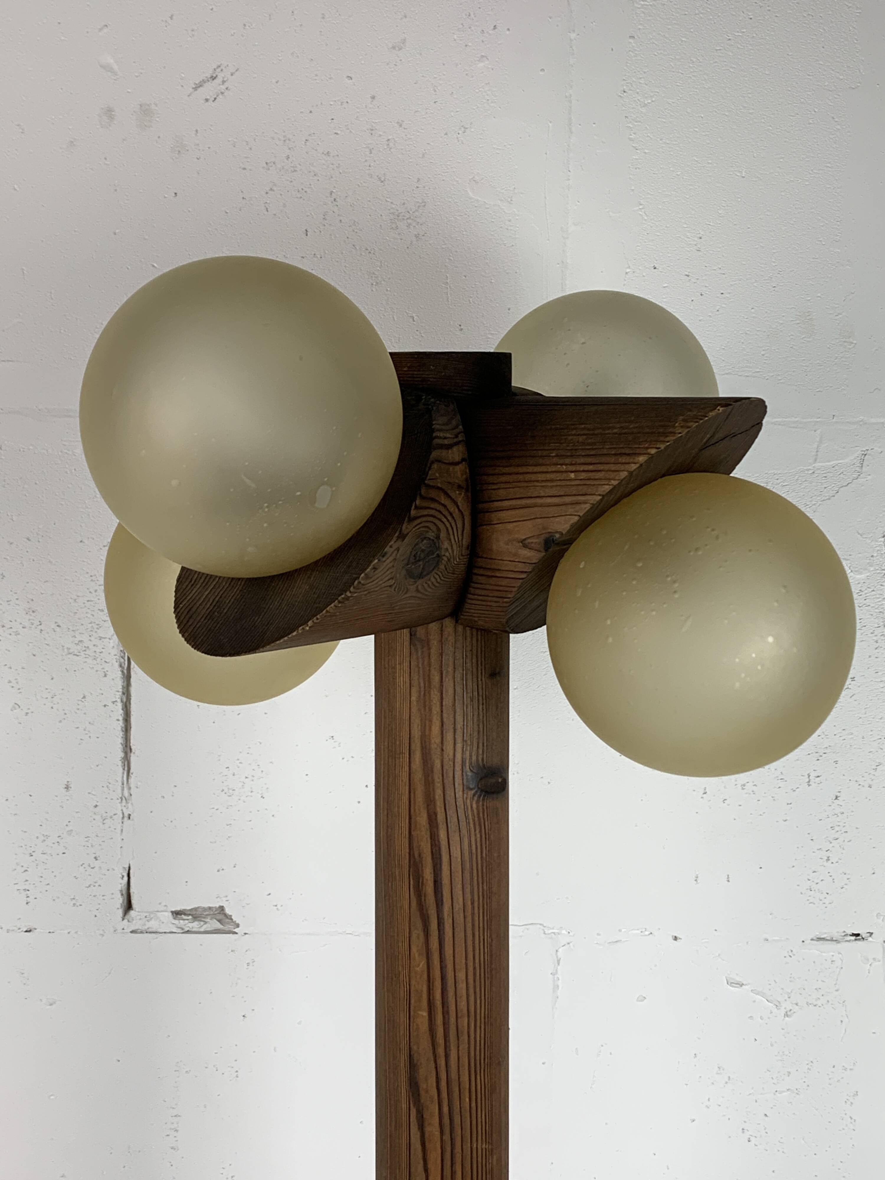 Midcentury brutalist oak floor lamp with 4 spheres, 1970s  by Temde Leuchten
