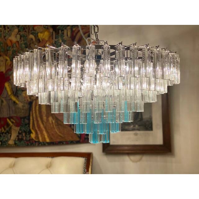 Contemporary transparent and ligh-blue triedro murano glass chandelier
