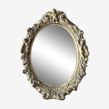 Golden molded oval mirror