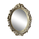 Miroir ovale mouluré doré