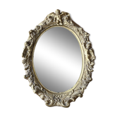 Miroir ovale mouluré doré