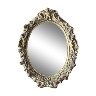 Golden molded oval mirror