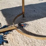 Living room table in gilded metal and marble.