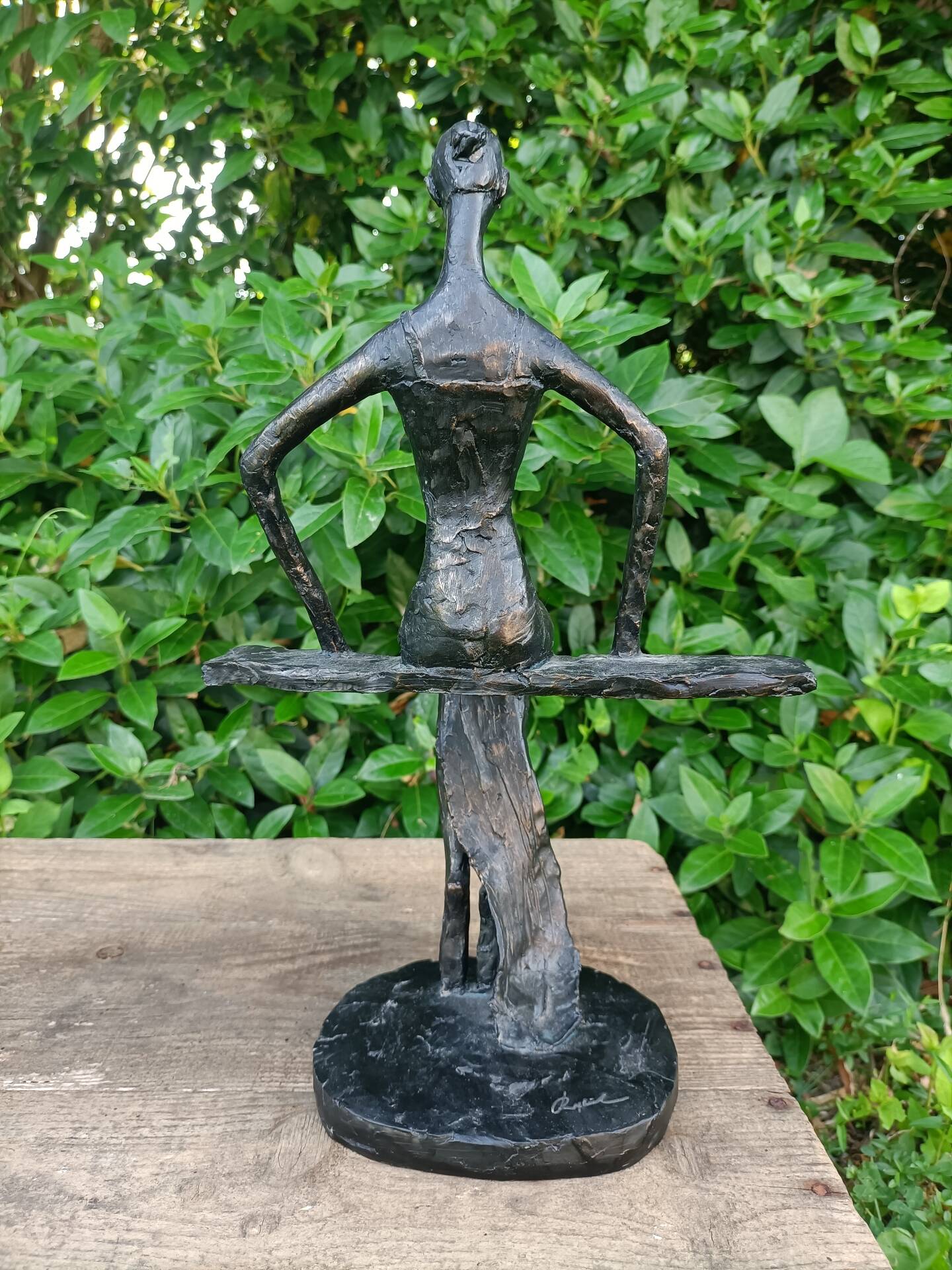 Sculpture of a dancer on a swing signed by Raphaël