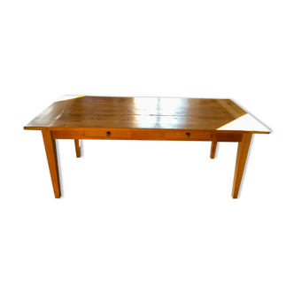 Teak table with extension cords