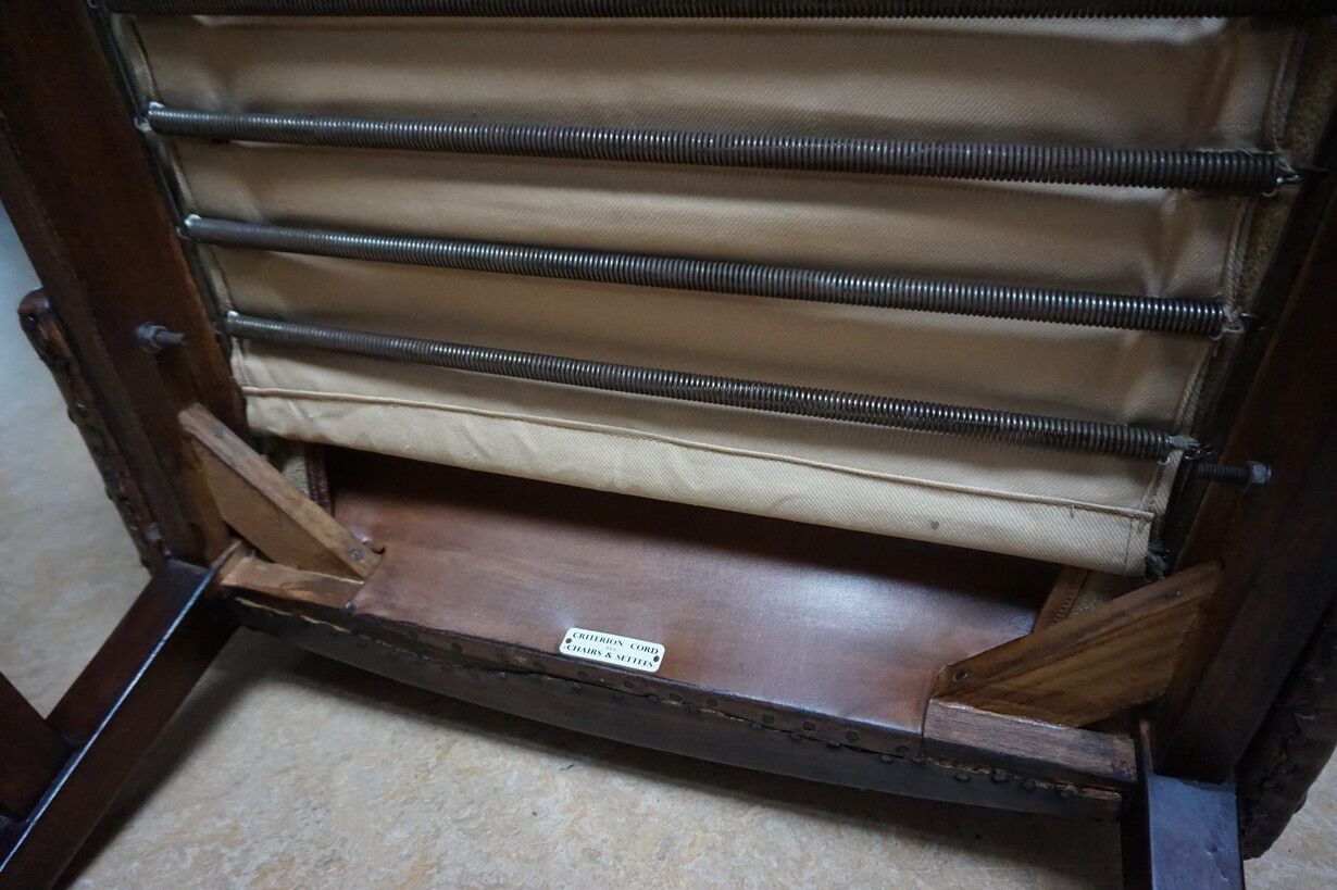 English high back cognac leather wingchair by Criterion cord