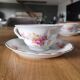 4 antique cups and saucers