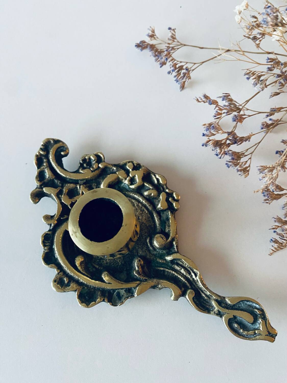 Antique bronze candle holder