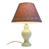 White marble lamp and vintage linen