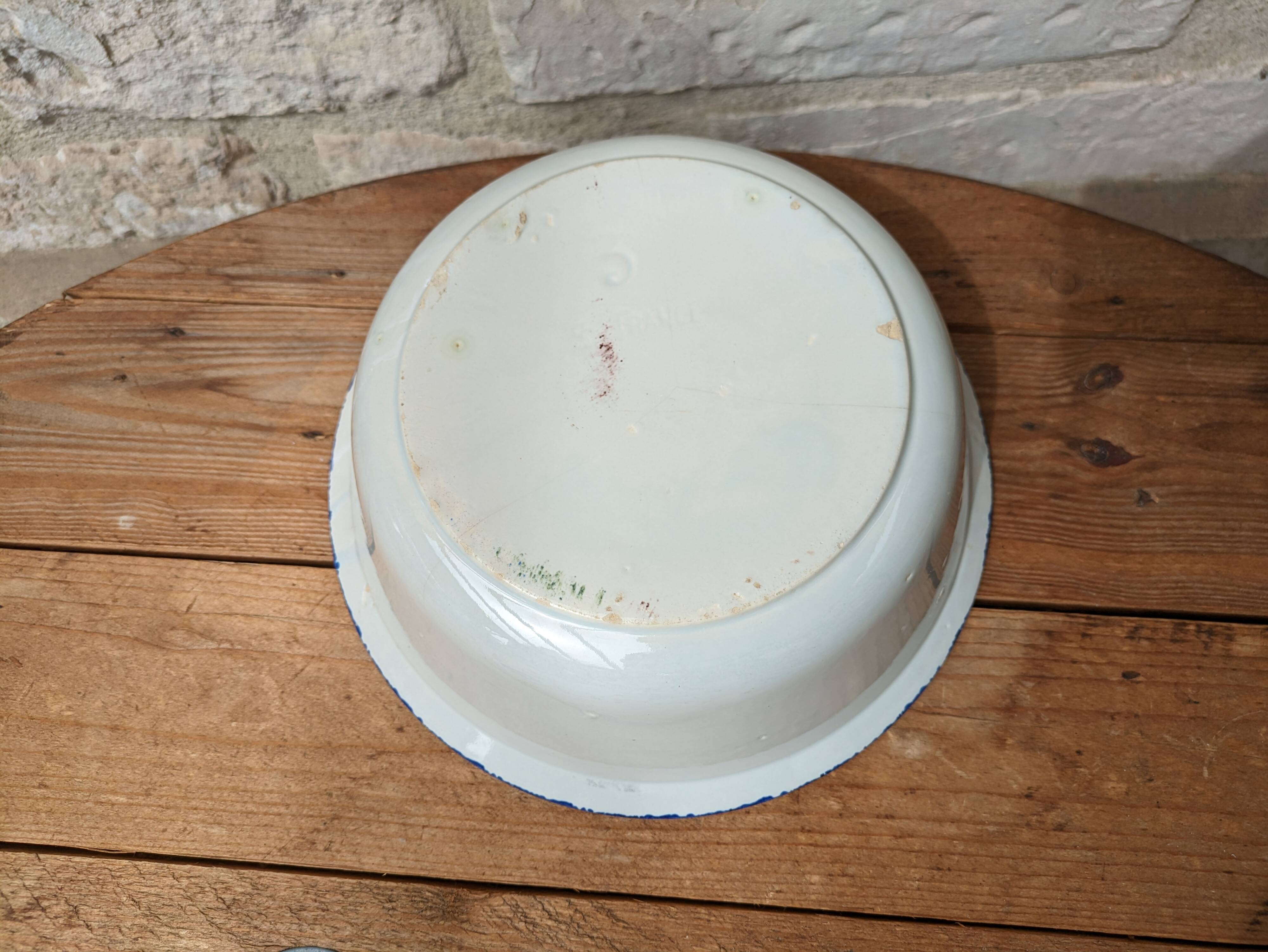 Old hollow serving dish with Saint Clément rooster motif France