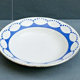 Plat creux bleu et blanc signé Saint Amand