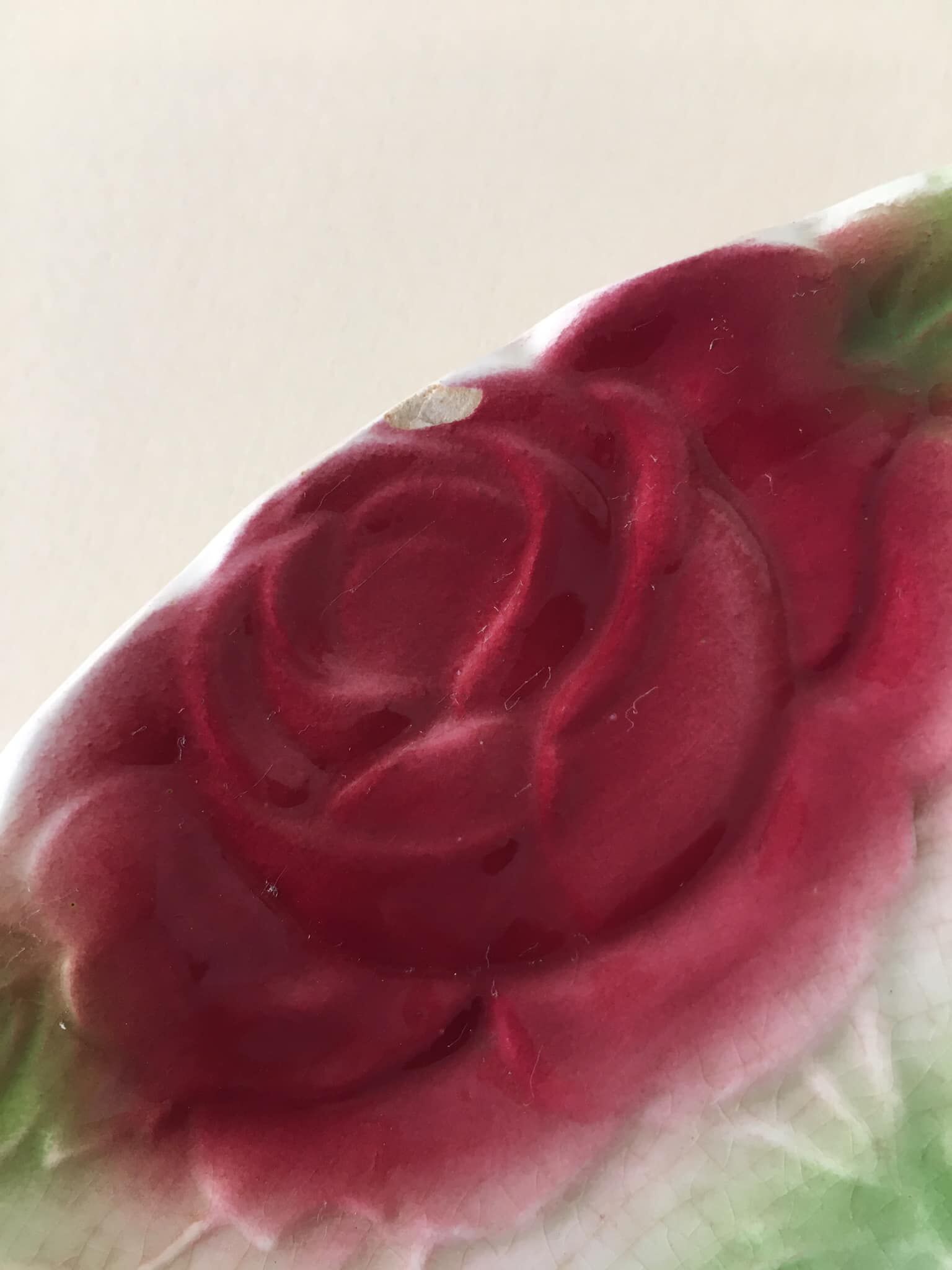 Old slip plate decorated with Majolica roses