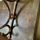 Patinated wood and metal coat rack from the 1950s.
