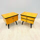 A pair of night cabinets