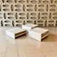 Modular square coffee tables in softened travertine