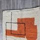 Traditional handmade wool Berber rug with colourful patterns.