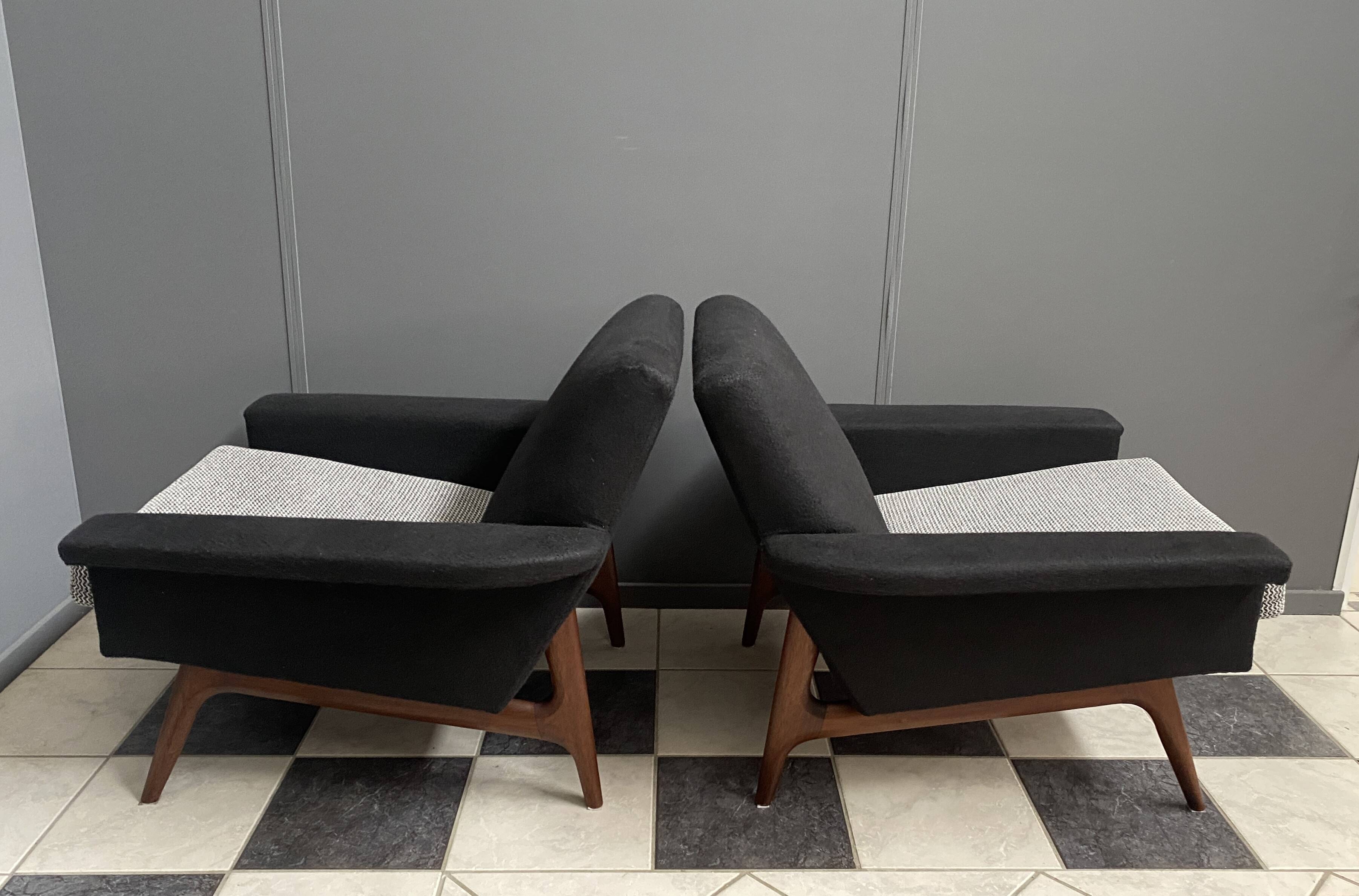 set of two black and white arm chairs 1960s
