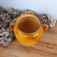 Old glazed terracotta grease pot
