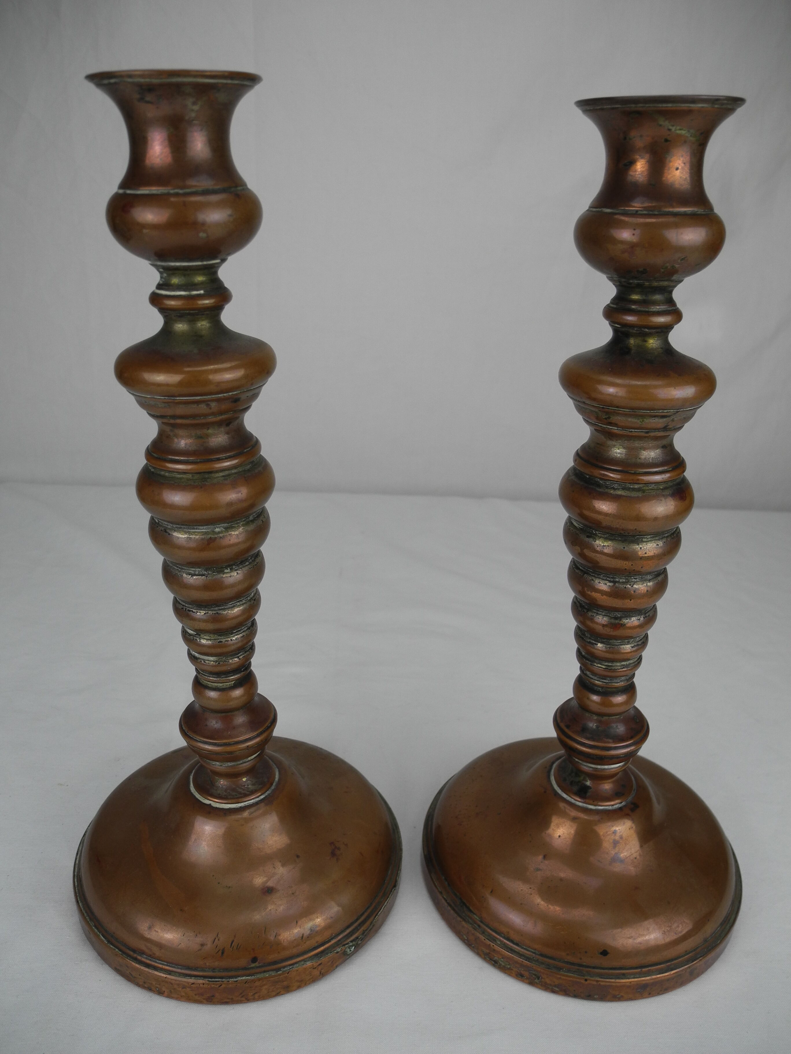 Pair of French copper candlesticks, 19th century