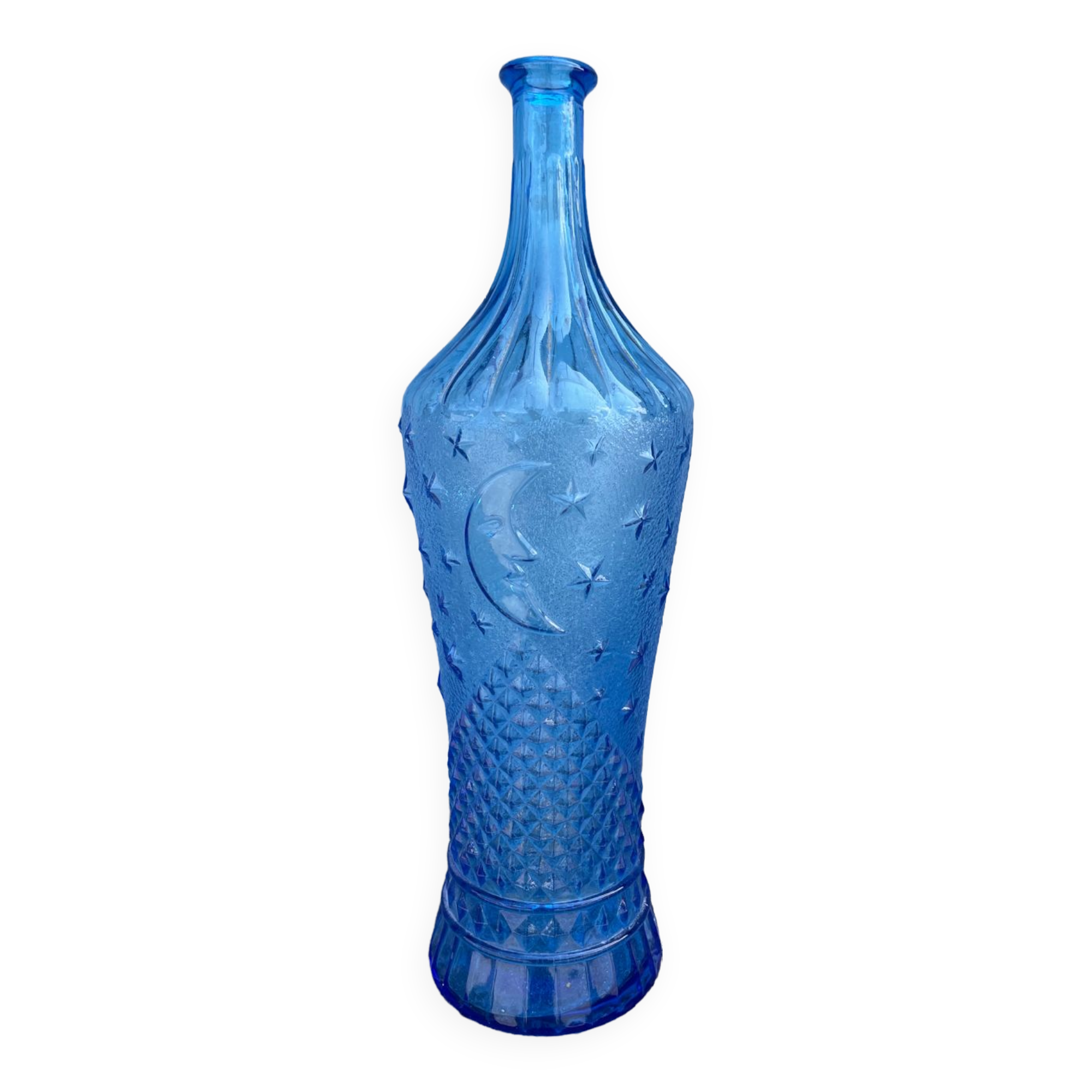 Blue glass decanter with a moon star motif