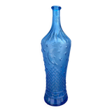 Blue glass decanter with a moon star motif