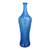 Blue glass decanter with a moon star motif