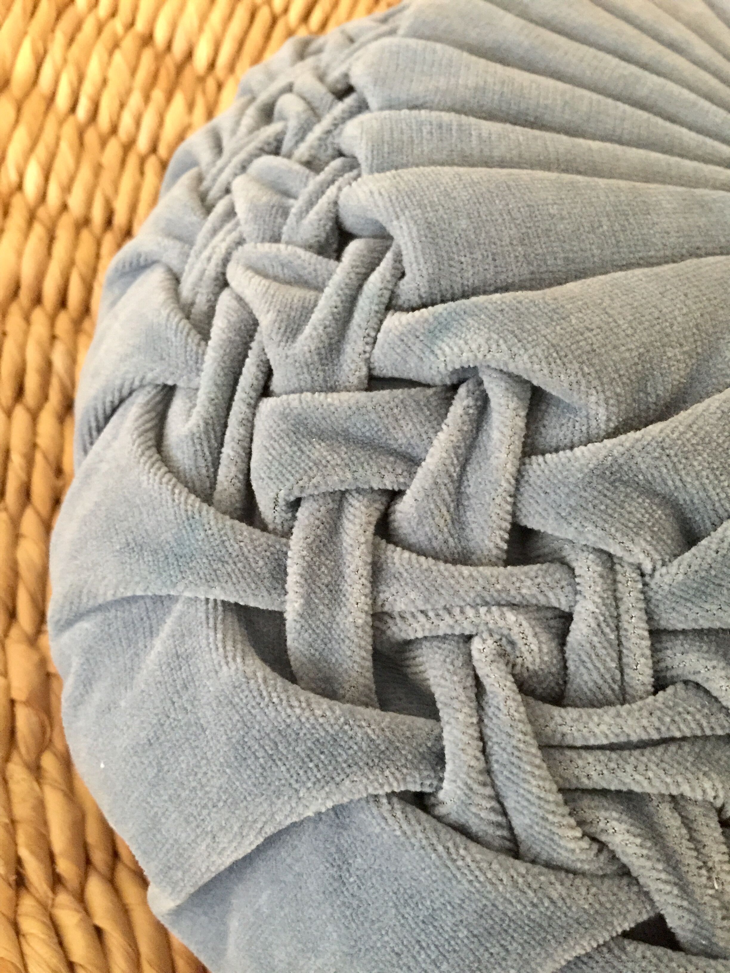 Blue pleated round cushion