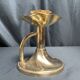 Brass candlestick in a fluted shape from the early 20th century.