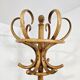 Coat rack and hat rack in curved wood