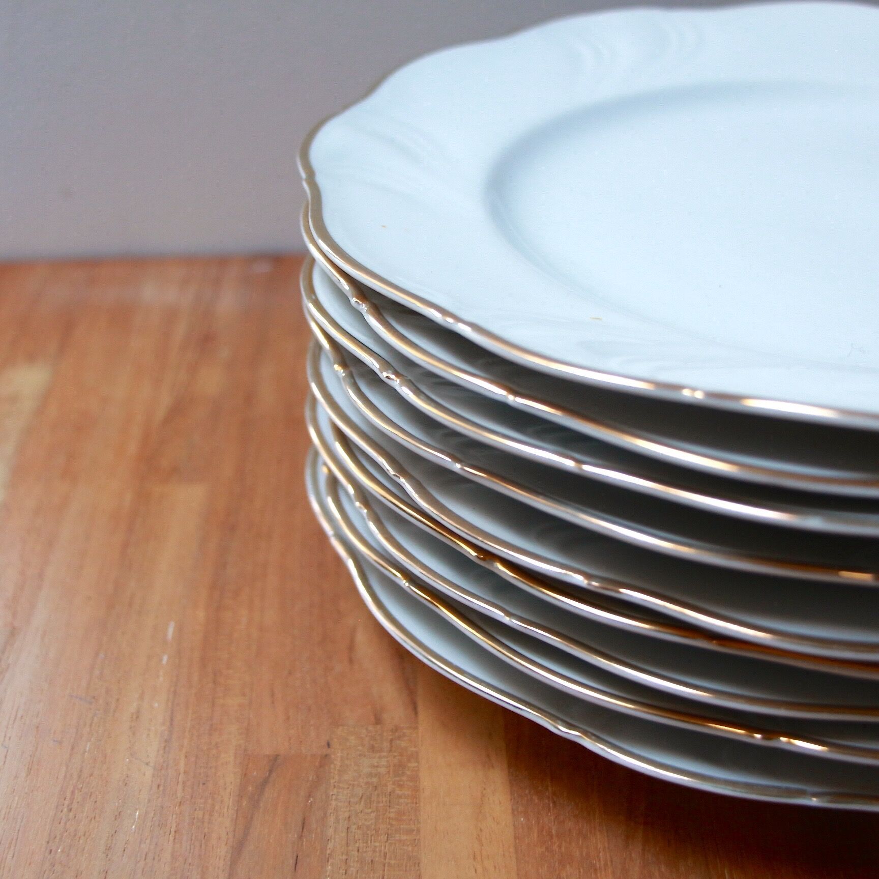 White and gold porcelain plates