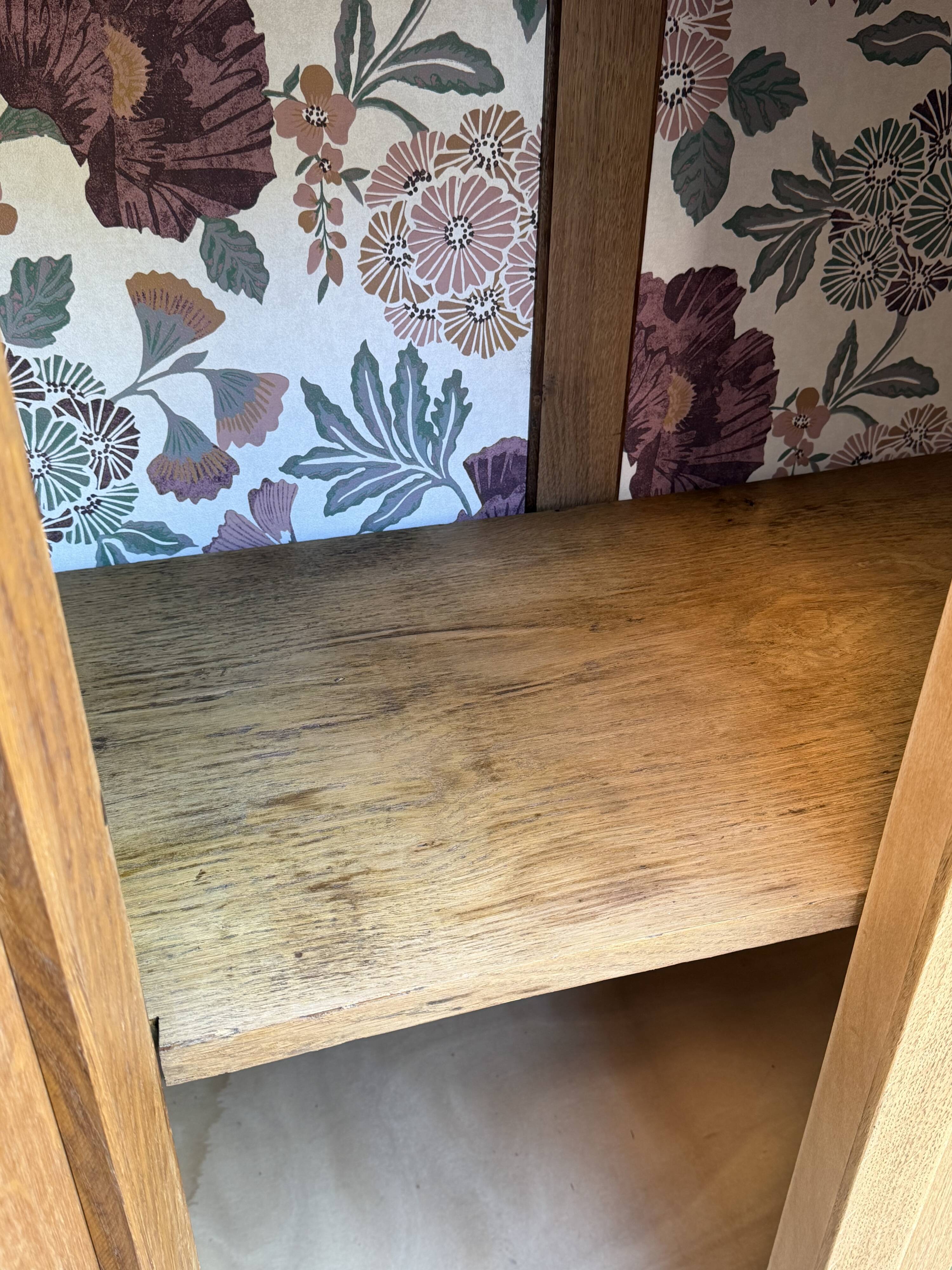 Art deco wardrobe in raw oak with bevelled mirror.
